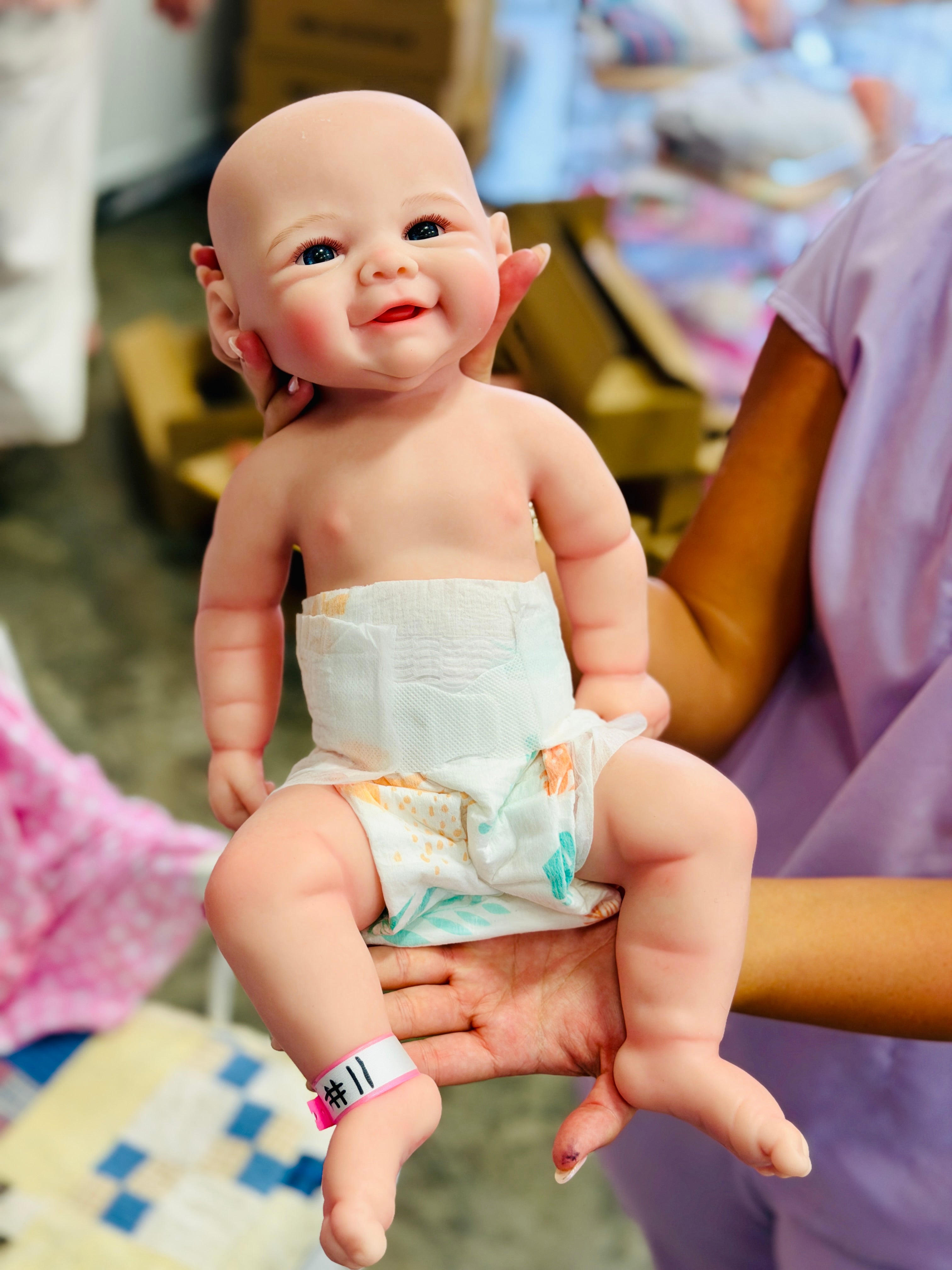 Perfectly Imperfect Full Silicone Baby Dolls — Blemished & Discounted (side view) — Little Mamas Nursery