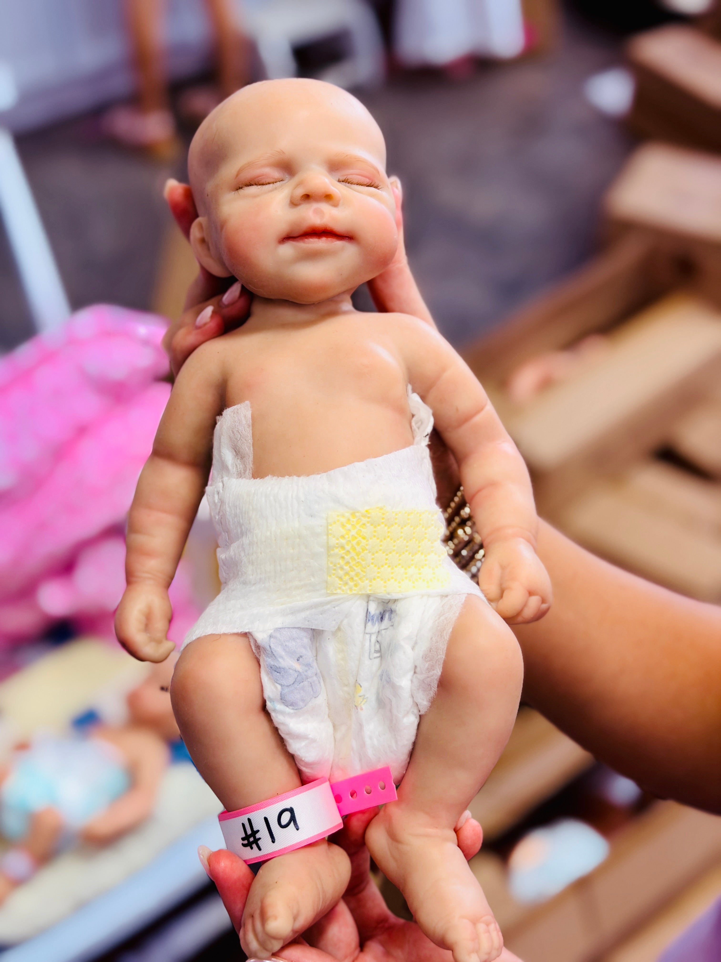 Perfectly Imperfect Full Silicone Baby Dolls — Blemished & Discounted (side view) — Little Mamas Nursery