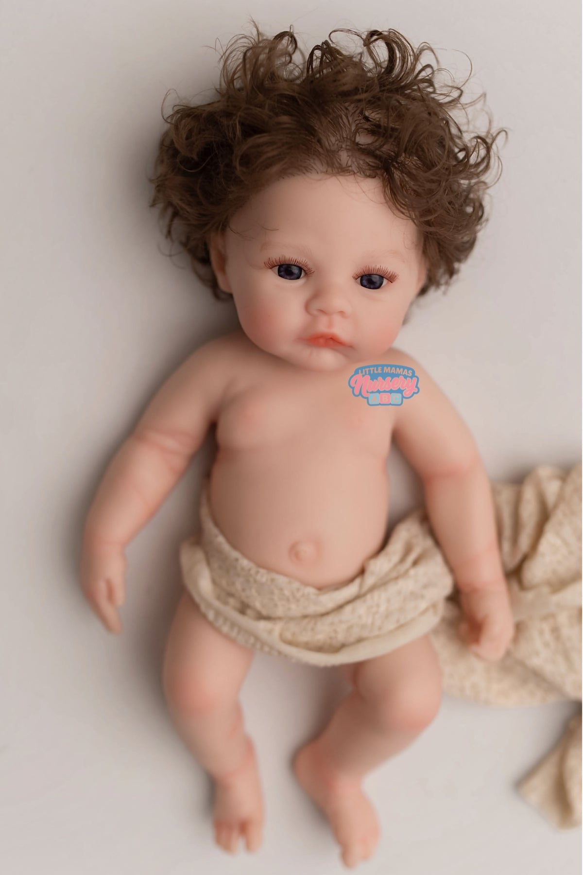 Nora, 12-inch fully platinum silicone baby doll (front view) — Little Mamas Nursery