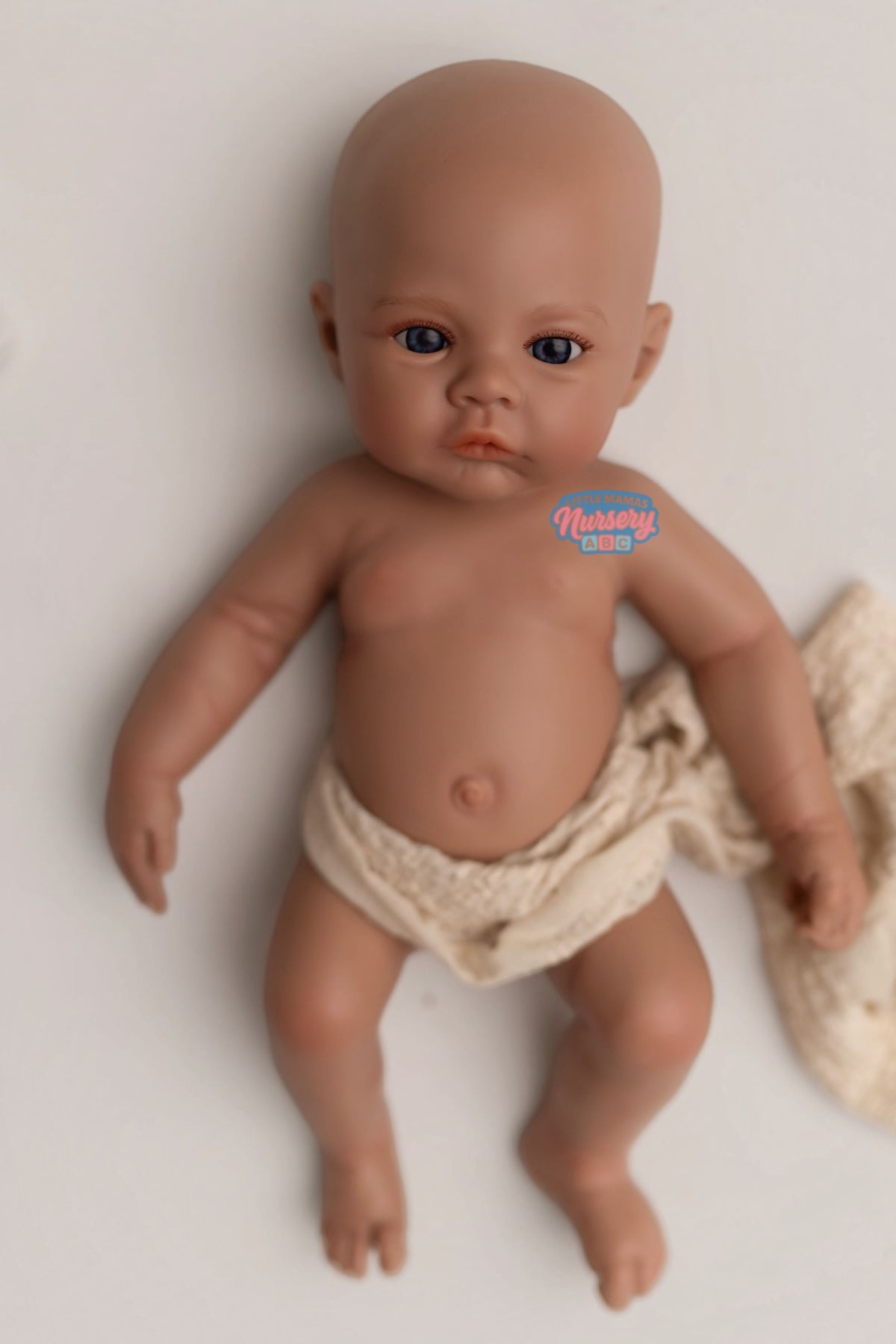 Nora, 12-inch fully platinum silicone baby doll (side view) — Little Mamas Nursery